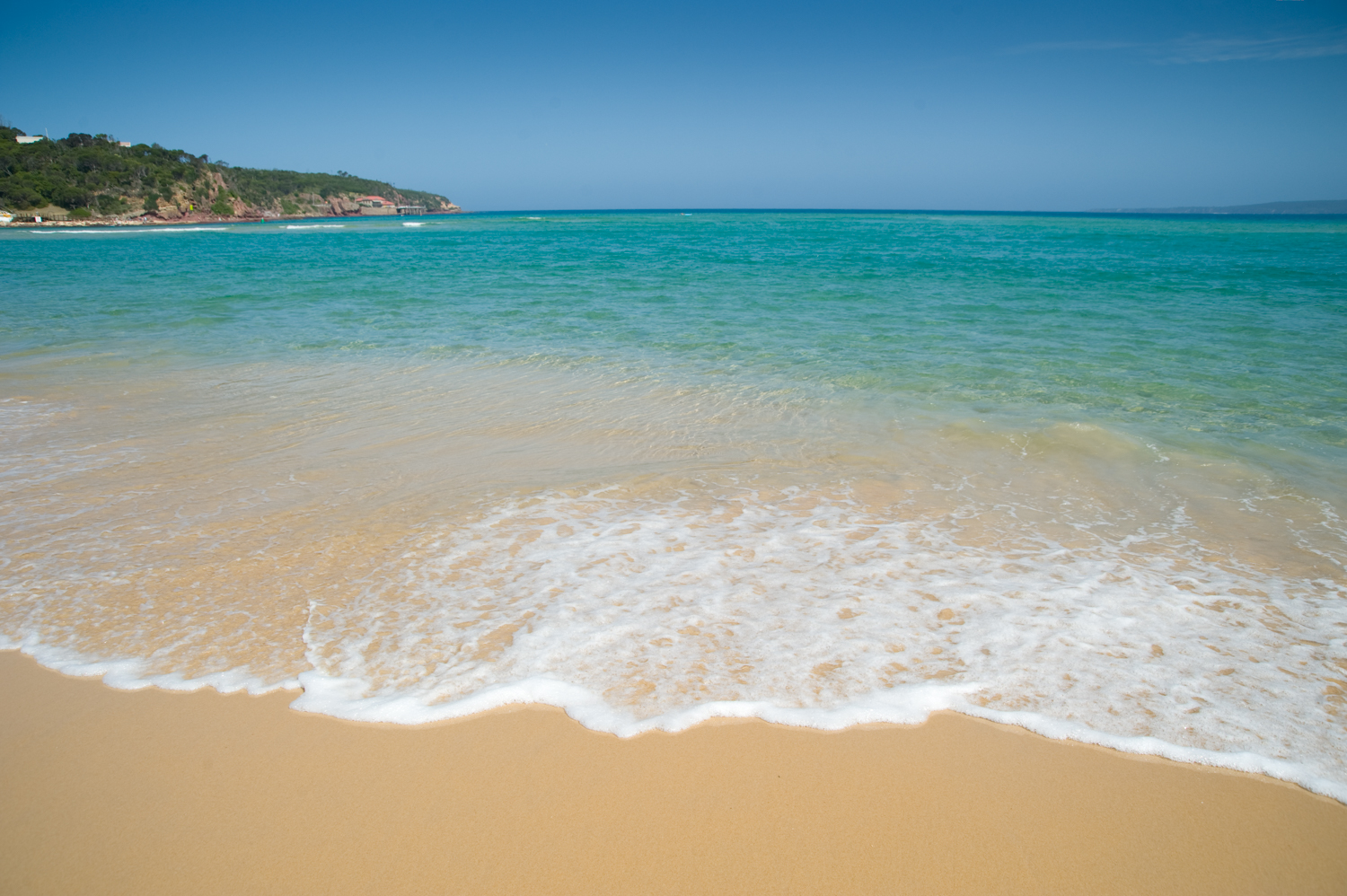 Beautiful clear sea water at the beach in Merimbula, Sapphire Coast, New South Wales.